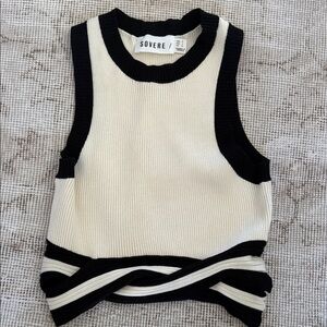 Sovere Knot Crop Top
Small
Cream and Black
Never worn